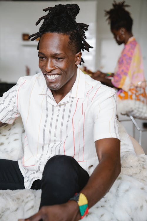 A Man in White Polo Smiling