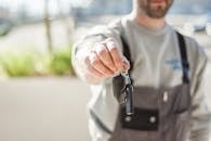 Shallow Focus Car Key held by a Man