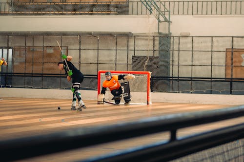 Men Playing Roller Hockey