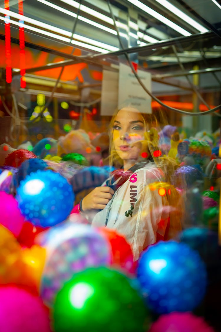 Colorful Balls Inside A Claw Machine