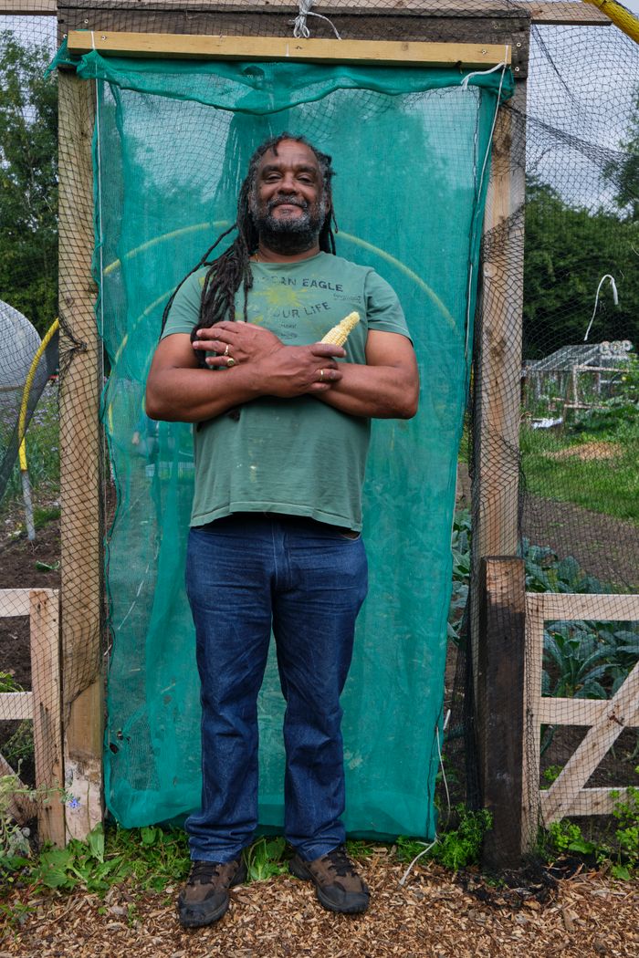 Community gardener holding fresh corn — photo by Centre for Ageing Better on Pexels