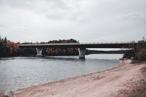 A Concrete Bridge Under the White Clouds