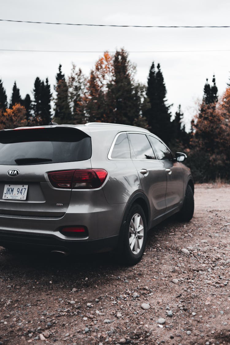 Car Parked On A Gravel Dirt Road