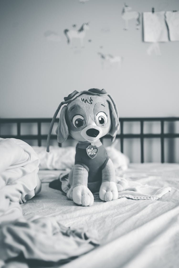 Stuffed Toy On The Bed 