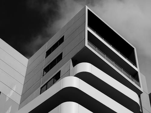 A Grayscale Photo of a Concrete Building