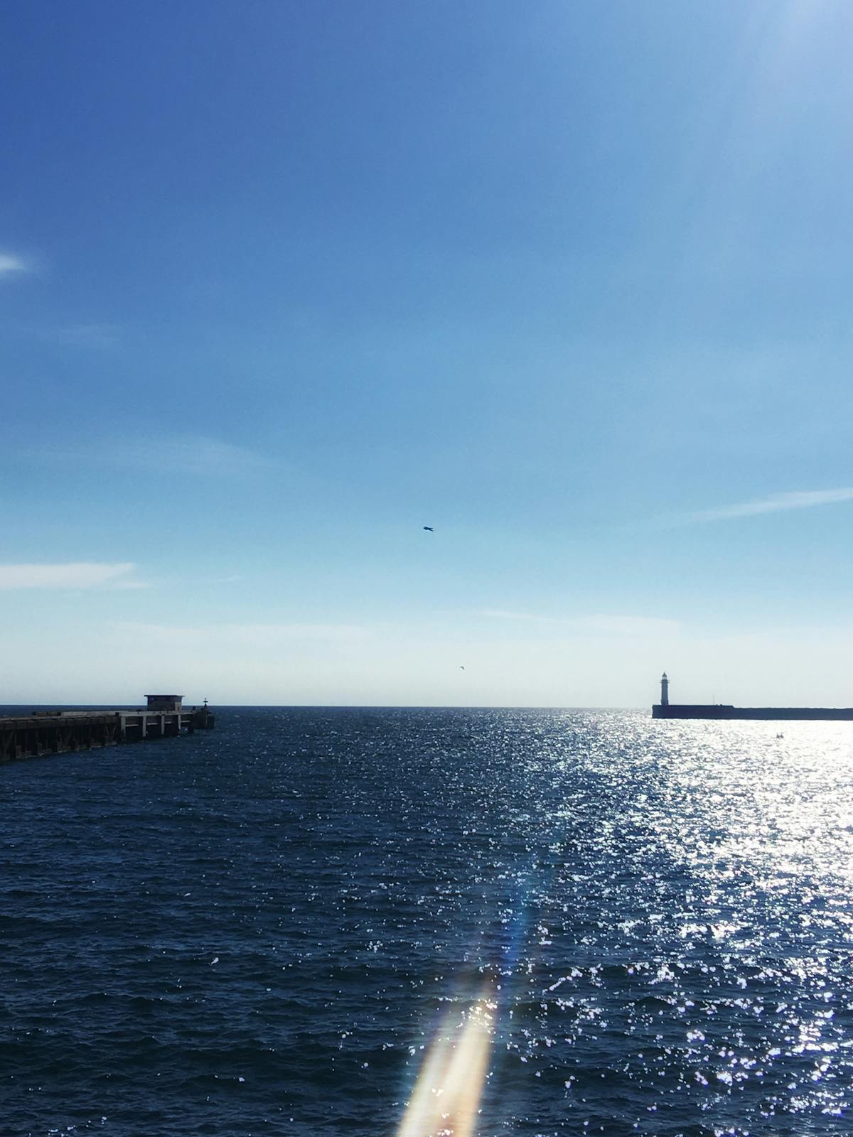 Young person recording a short-form video on a smartphone with music