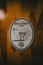 Signage on Wooden Door