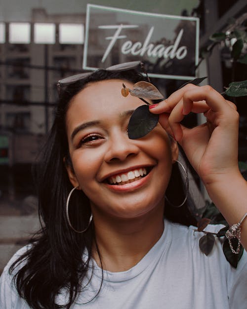 A Woman Smiling at the Camera