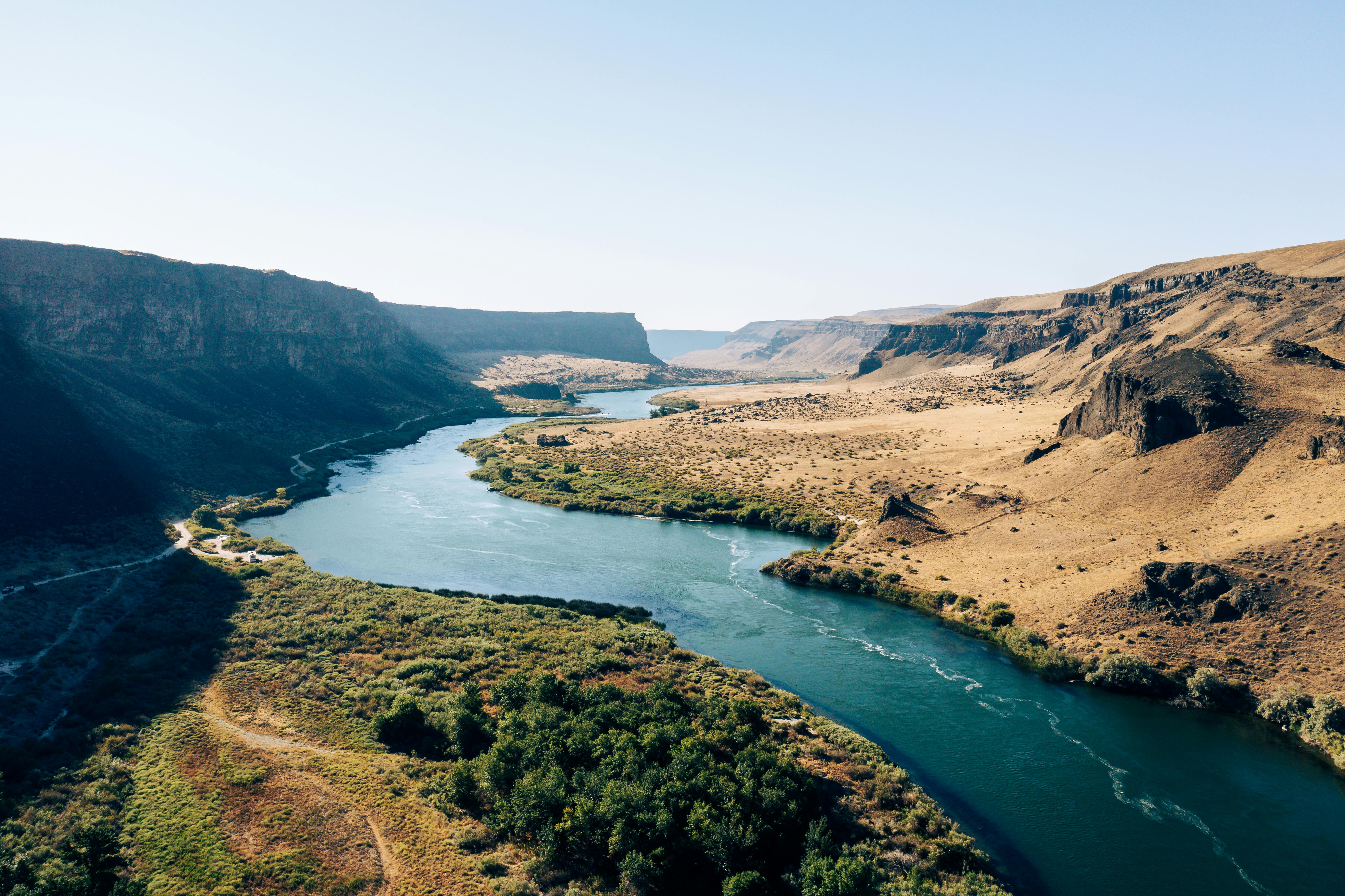 A breathtaking aerial view of the Boise River winding through a canyon landscape in Idaho.