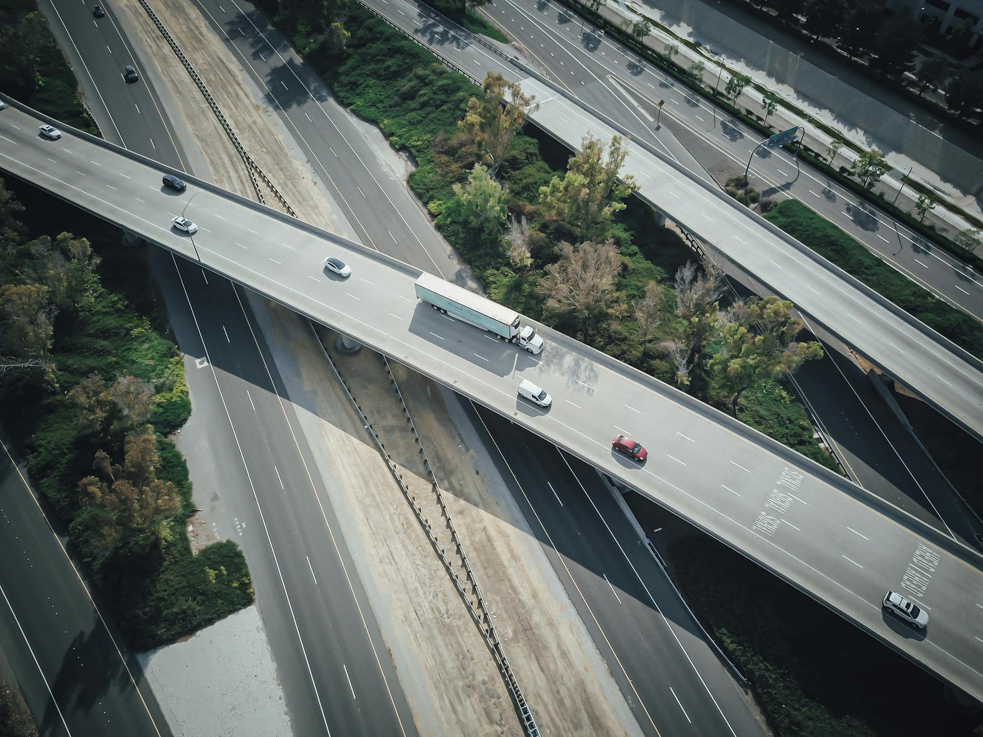 Vehicles on Asphalt Highways