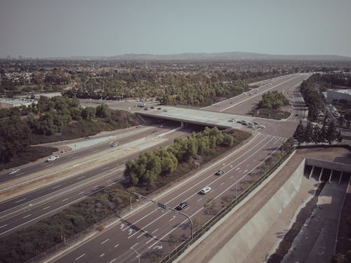 Aerial Photography of Moving Cars on a Highway During Daytime