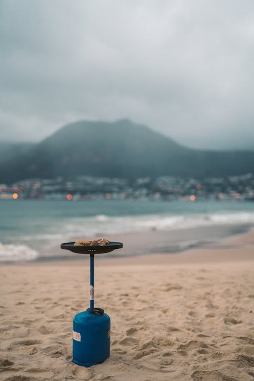 Gas Bottle with Table on Beach