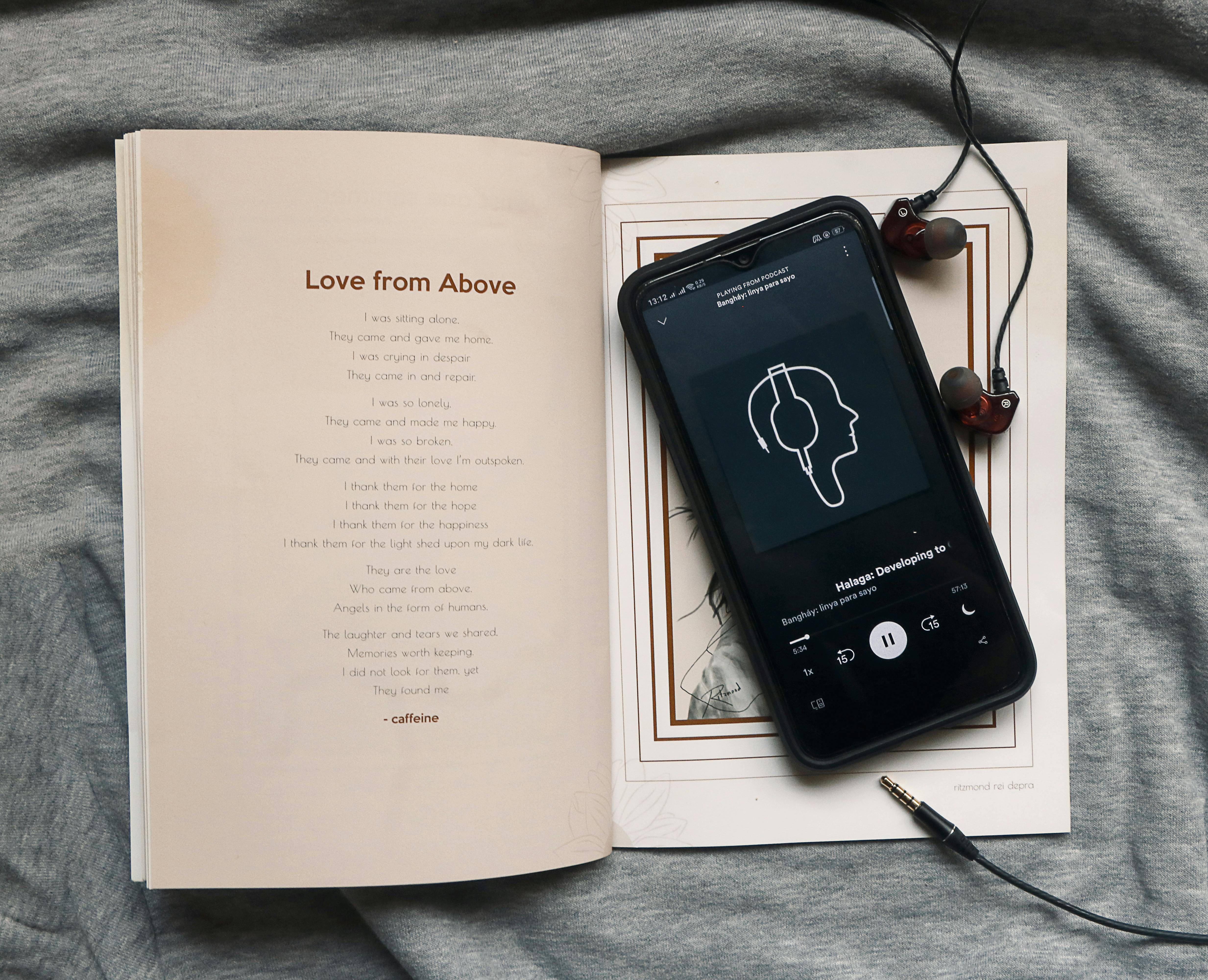 a smartphone on the top of a book