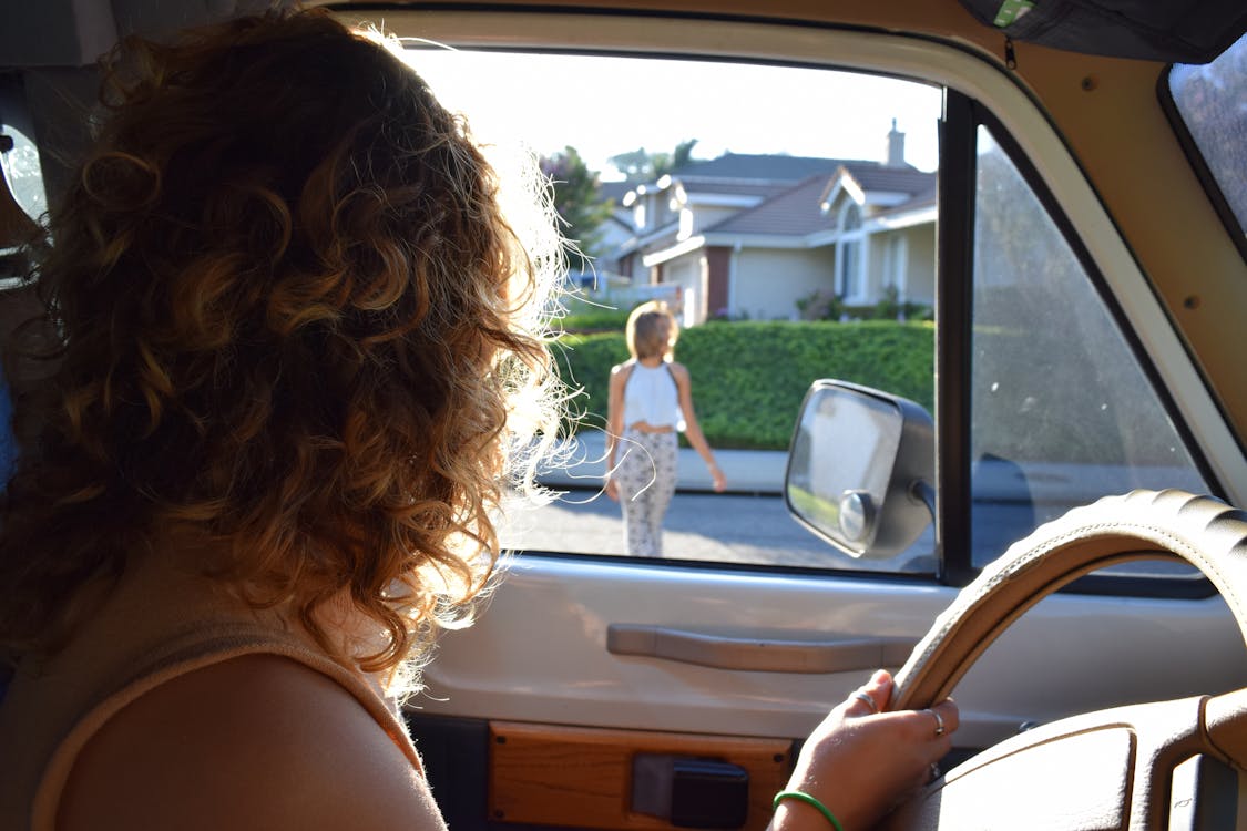 Free Person Driving Vehicle Looking Sideways Stock Photo