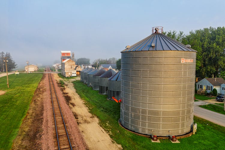 Silos By Railway Line