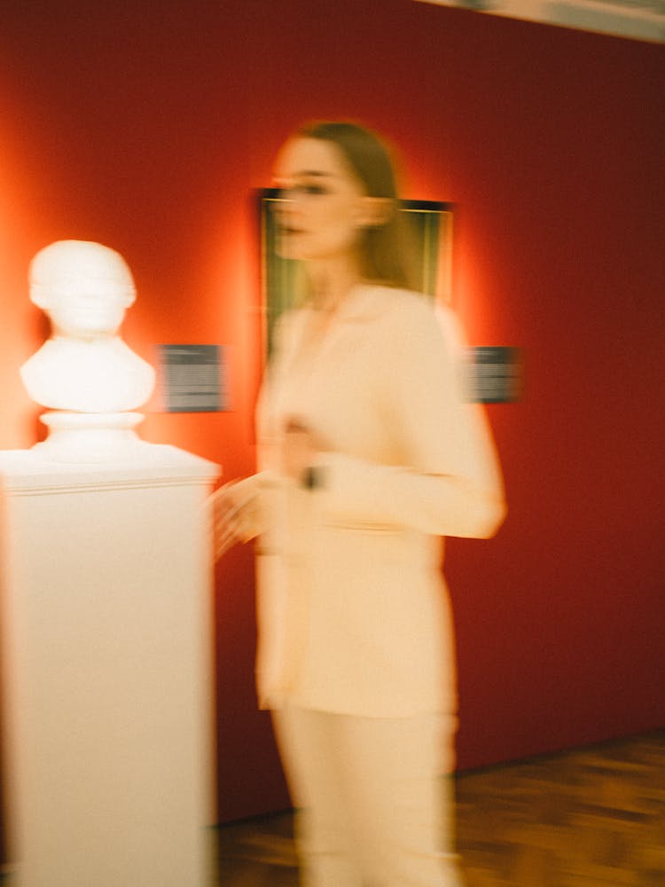 Hologram Of A Woman In White Suit