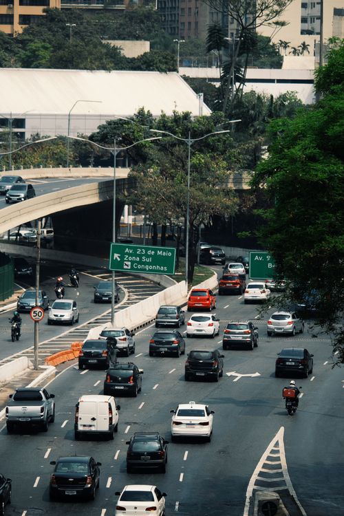 Free Busy urban expressway in Sao Paulo, Brazil with traffic and cityscape. Stock Photo