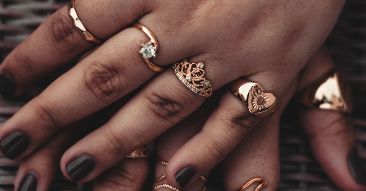 Hands Wearing Gold Rings · Free Stock Photo