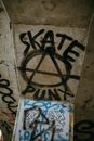 Graffiti on wall, skateboarding