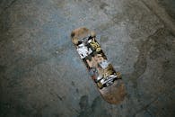 Skateboard lying on ground upside down