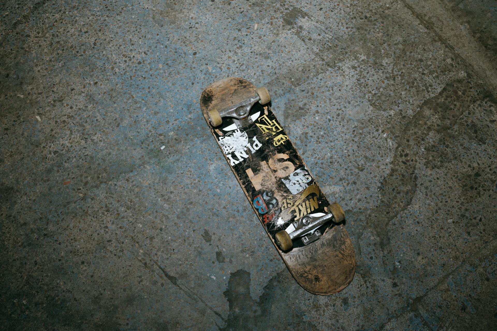 Skateboard lying on ground upside down