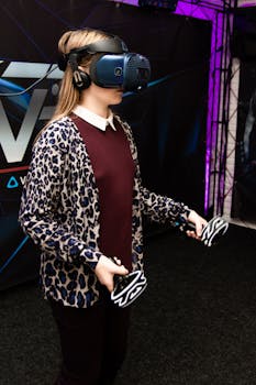 Woman using VR headset and controllers for immersive experience indoors.