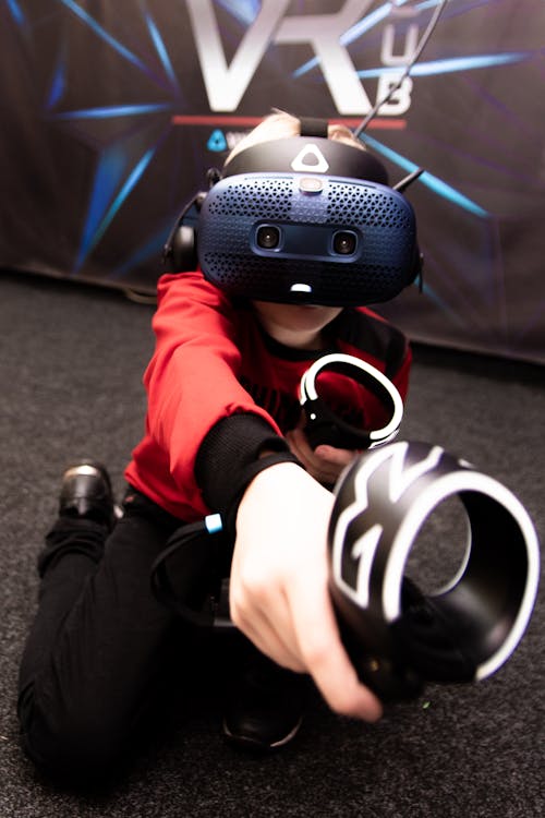Child Playing with VR Goggles