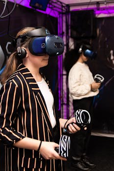 Two women using VR headsets and controllers in an indoor setting.
