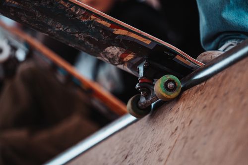 Free Close-up of a skateboarder executing a trick on a ramp in Prague, capturing movement and excitement. Stock Photo