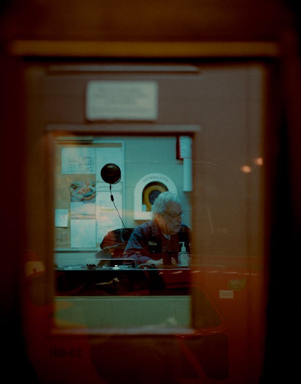 Man Sitting at the Desk 