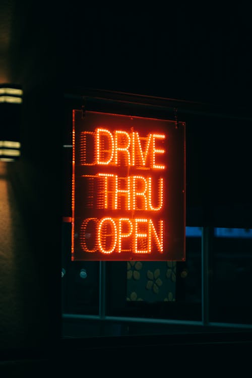 Close up view of neon drivethru sign