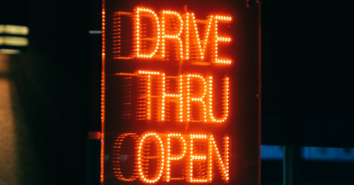 Close up view of neon drivethru sign · Free Stock Photo