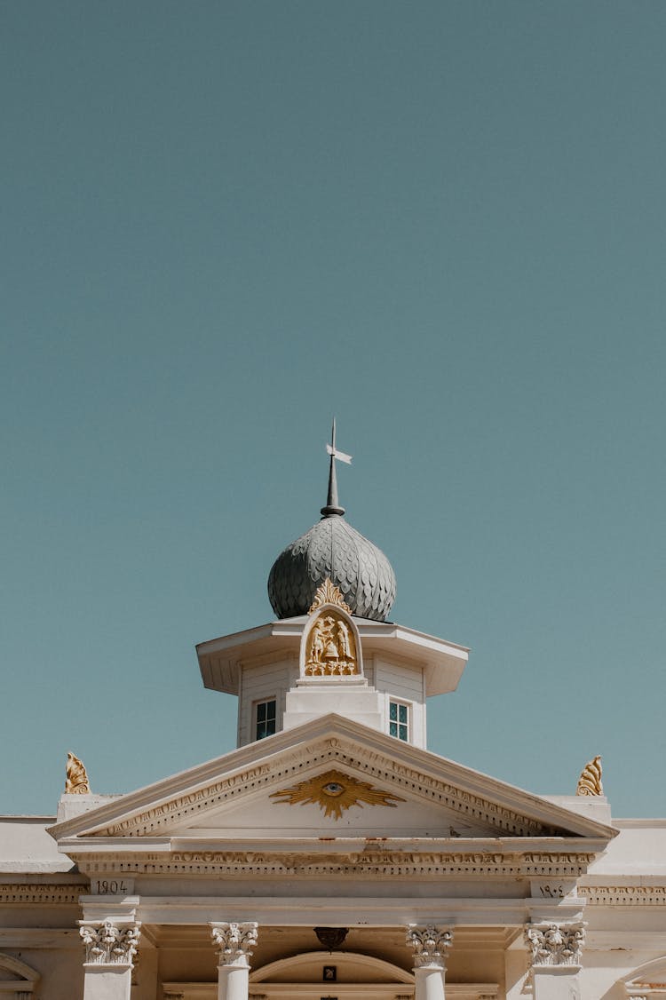 Illuminati Symbol On The Roof Of An Ornate House