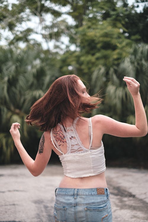 Back View of a Woman Flipping her Hair