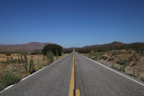 Free Gray Concrete Road in the Desert Stock Photo