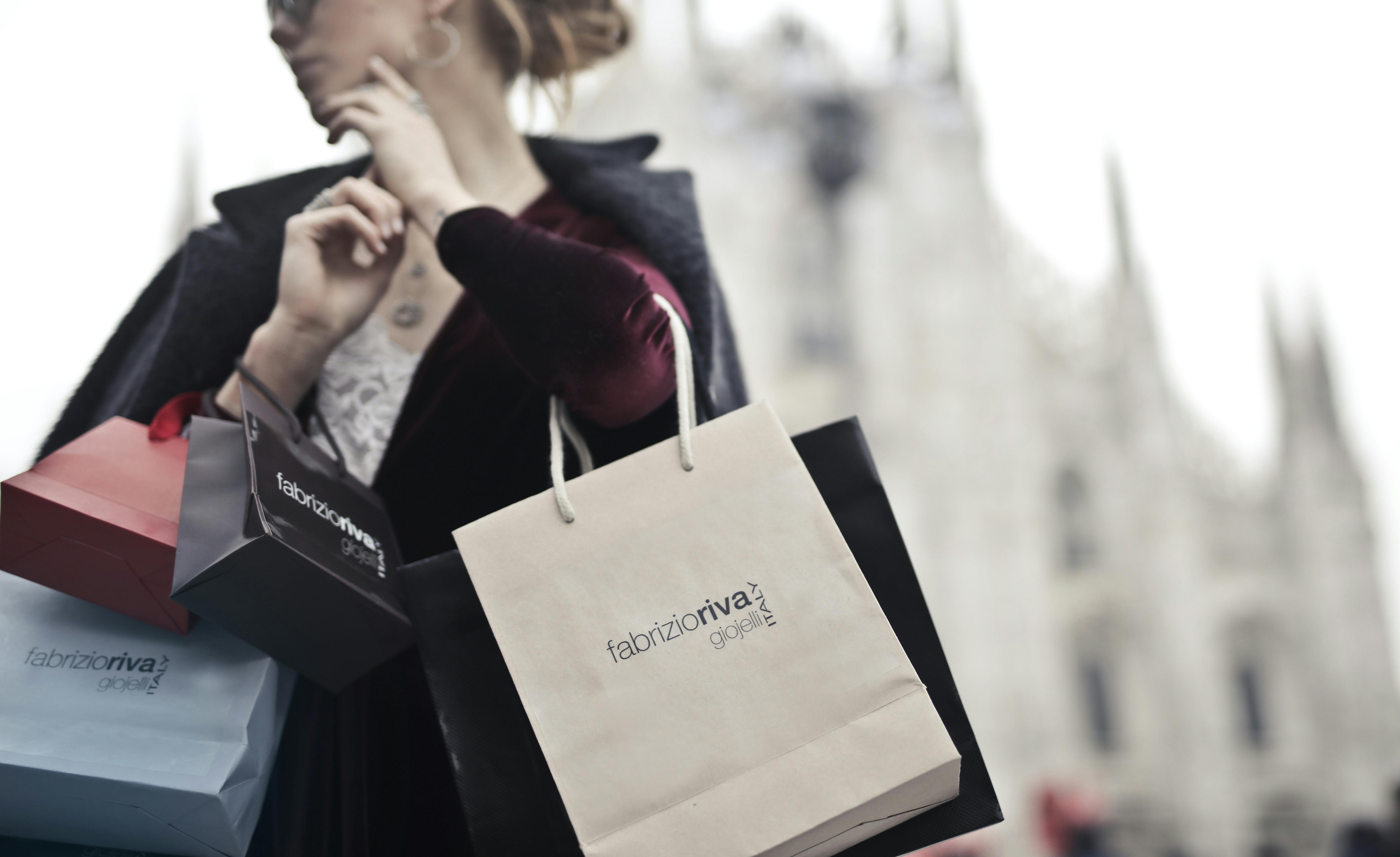 Woman Holding Shopping Bags · Free Stock Photo