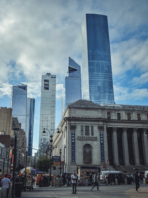 City Buildings Under Cloudy Sky