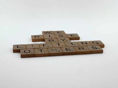 Free Wooden Scrabble Tiles on White Surface  Stock Photo