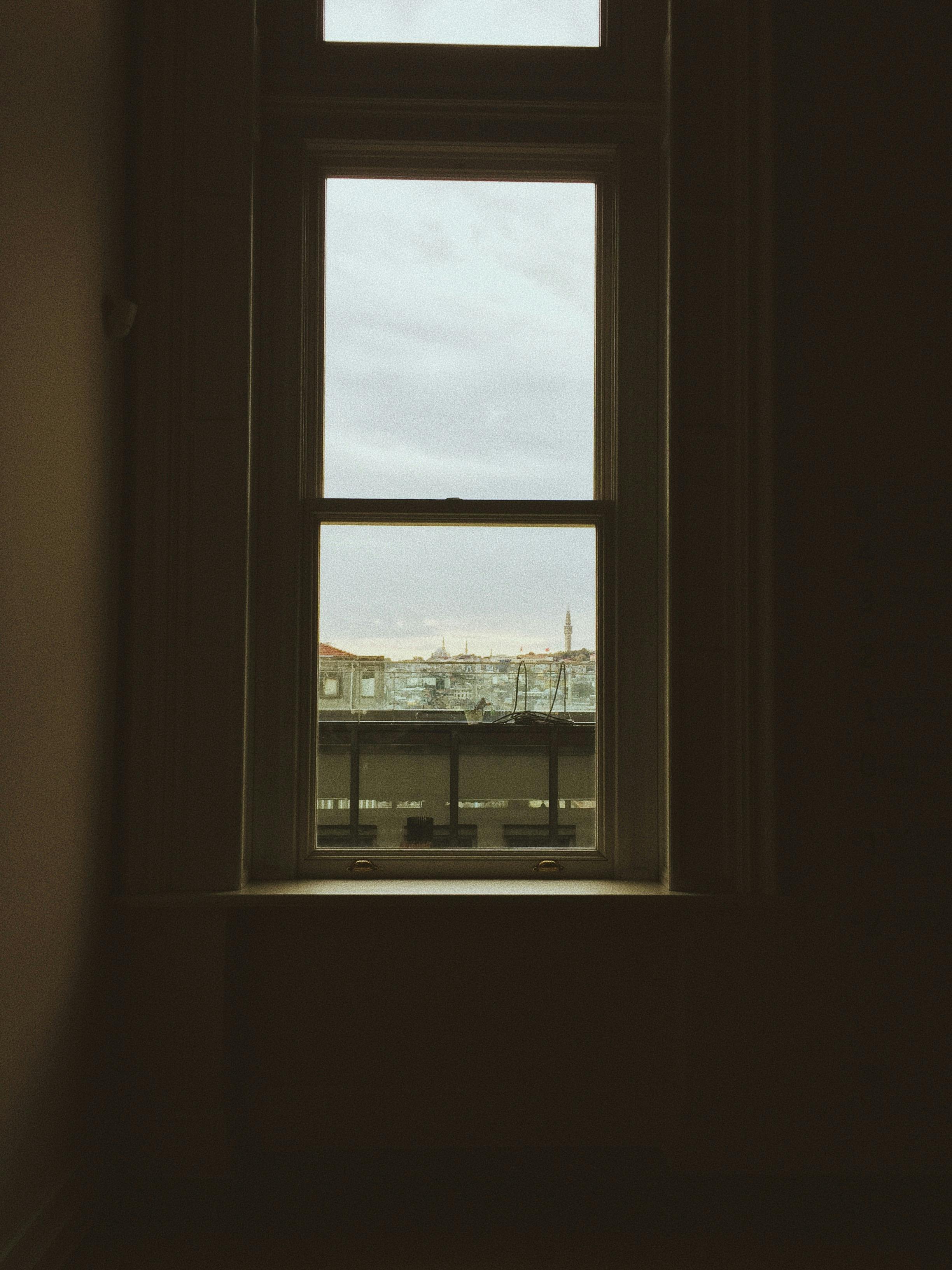 Photo Of a Wooden Framed Glass Window · Free Stock Photo