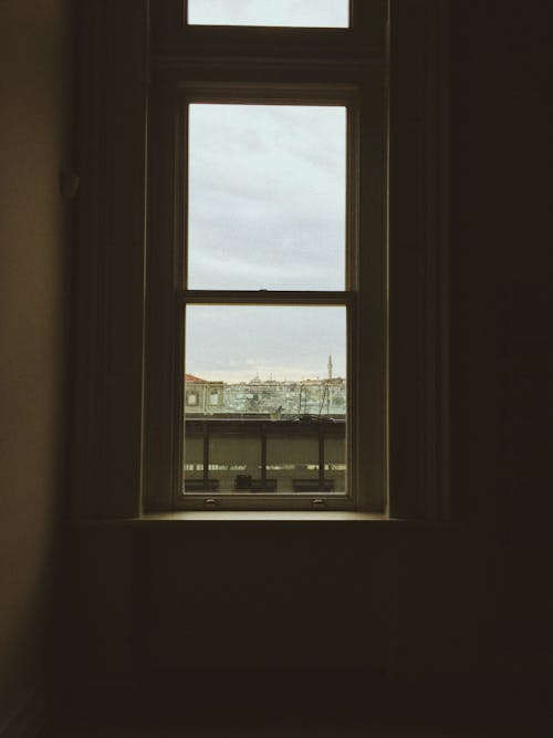 Photo Of a Wooden Framed Glass Window
