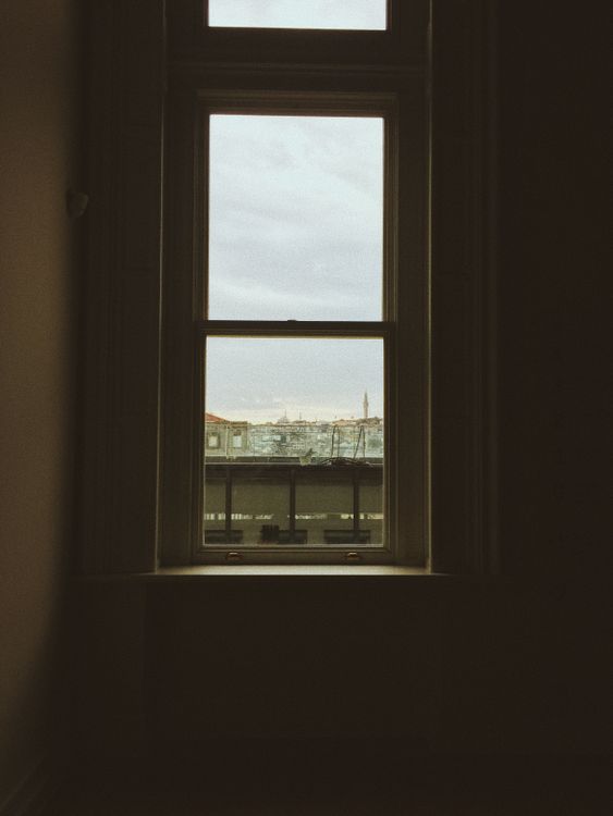 Photo Of a Wooden Framed Glass Window · Free Stock Photo