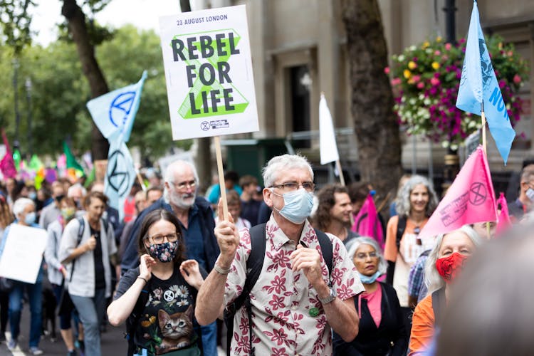 Crowd Of People With Placards And Banners On Demonstration