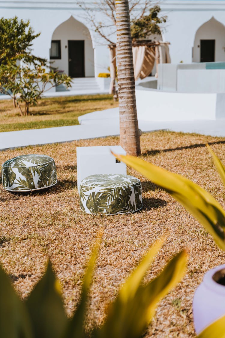 Stool Chairs On The Garden Grass