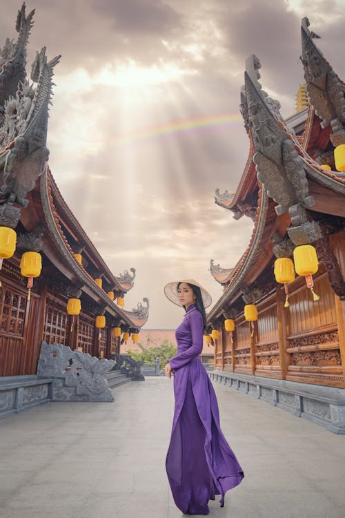 Woman in Purple Dress Standing on Temple Square