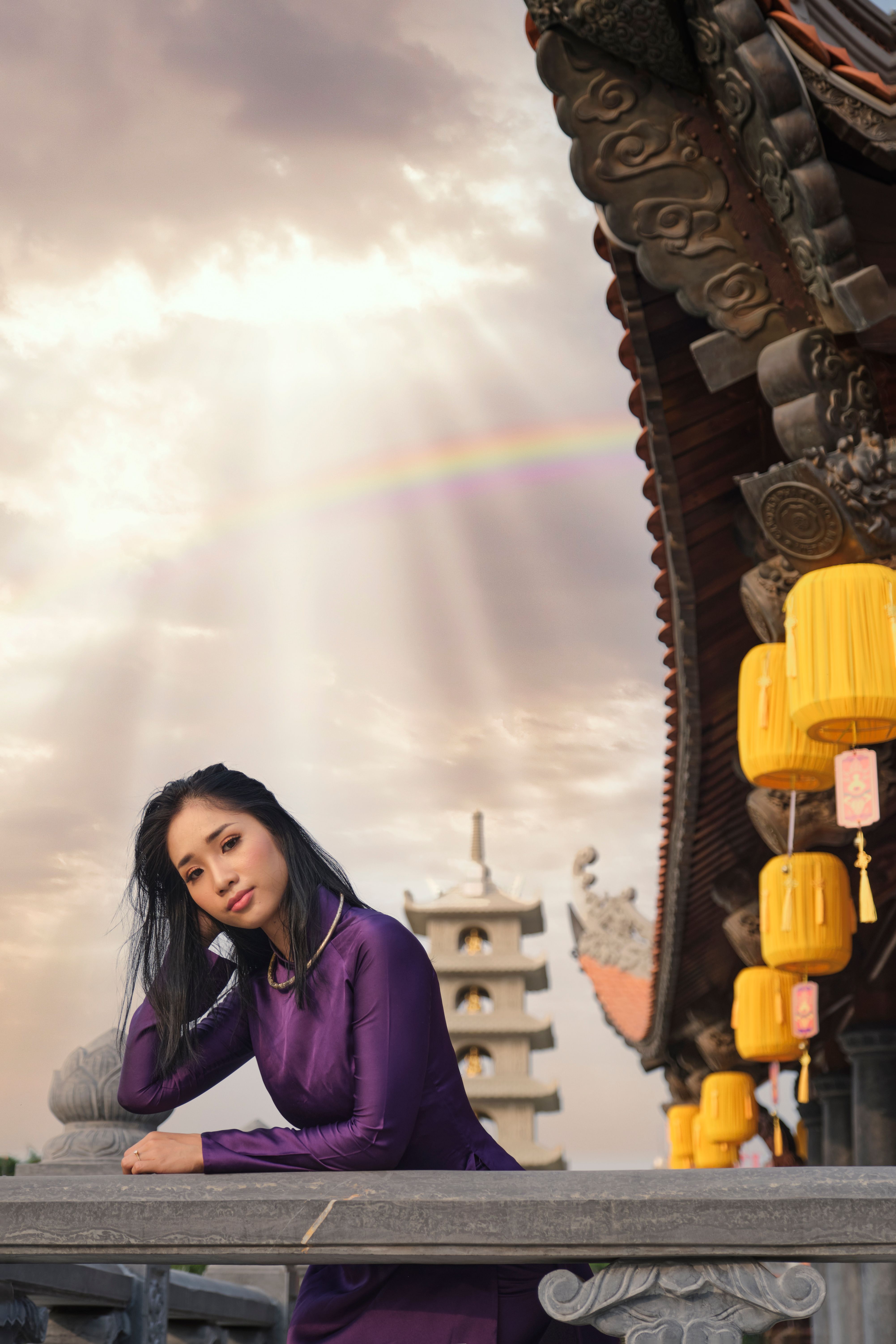 Woman in a Purple Dress Posing · Free Stock Photo