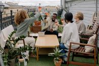People Drinking Wine on House Veranda