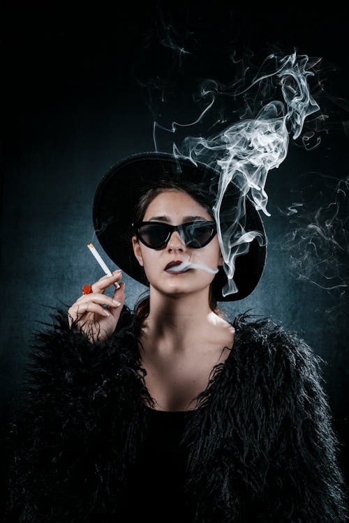 Woman in Black Fur Coat Smoking Cigarette