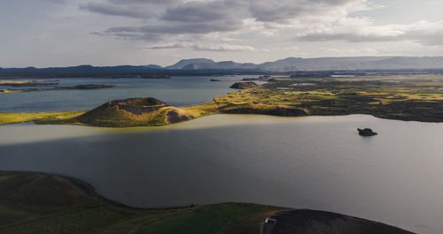 Free A breathtaking aerial view of Iceland's serene lakes and volcanic landscapes bathed in gentle light. Stock Photo