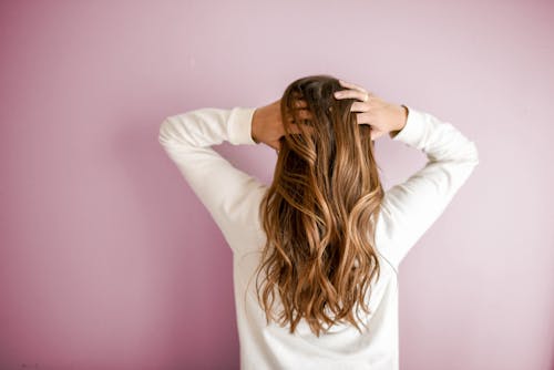 Free Woman Wearing White Long-sleeved Shirt Stock Photo