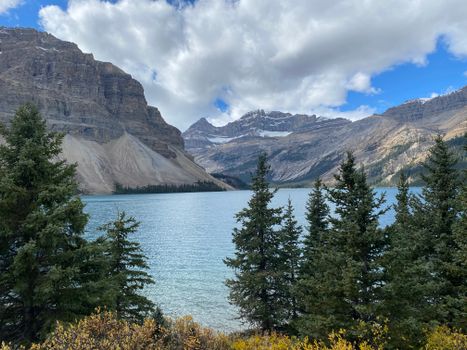 Breathtaking view of Bow Lake with snow-capped mountains in Banff National Park.